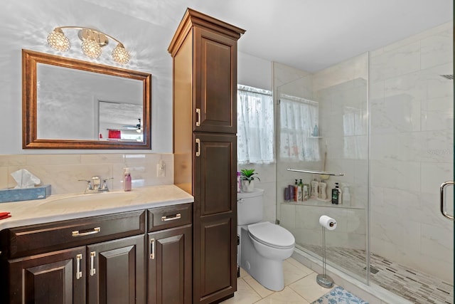 13565 86th Ave, Seminole, FL 33776 - full bathroom featuring tile walls, vanity, a stall shower, and tile patterned floors