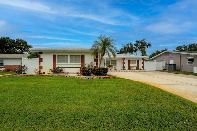 13565 86th Ave, Seminole, FL 33776 - single story home featuring driveway and stucco siding