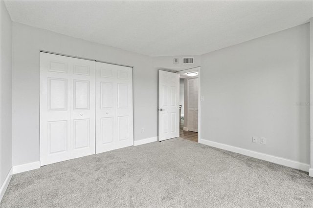 51 Island Way Unit 411, Clearwater Beach, FL 33767 - unfurnished bedroom with carpet floors and a closet
