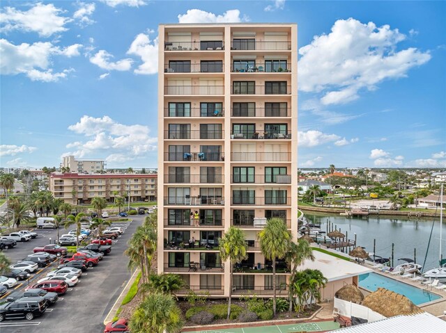 51 Island Way Unit 411, Clearwater Beach, FL 33767 - view of apartment building / complex with a water view