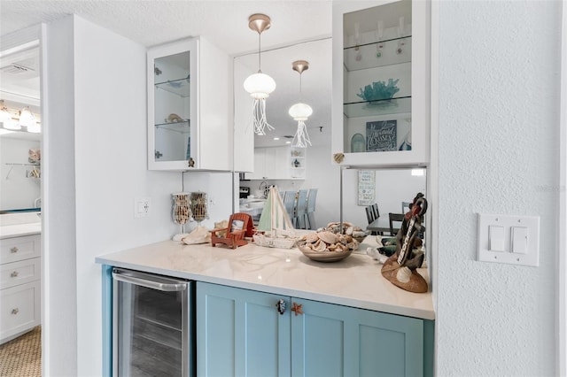 18500 Gulf Blvd Unit 503, Indian Shores, FL 33785 - indoor dry bar featuring wine cooler and pendant lighting