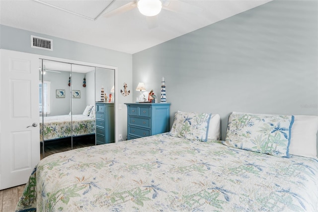 18500 Gulf Blvd Unit 503, Indian Shores, FL 33785 - bedroom featuring wood finished floors, a closet, and ceiling fan