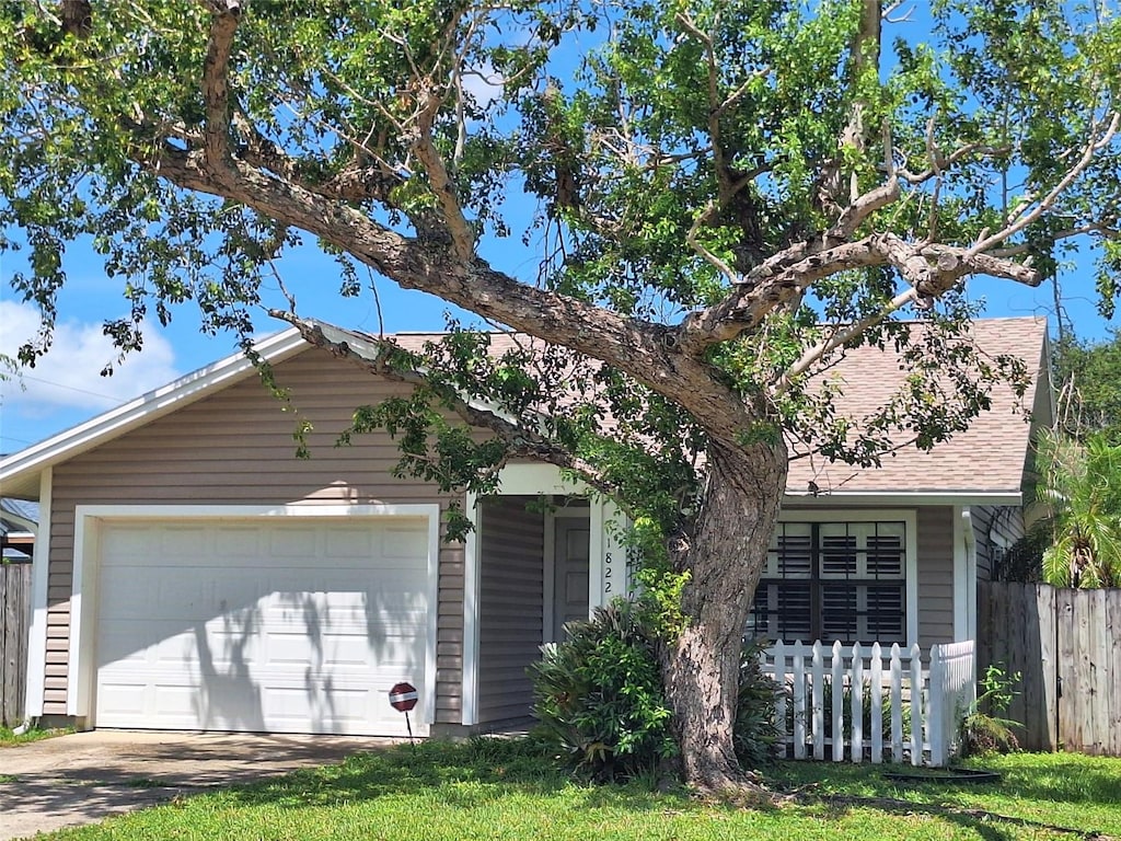 1822 Tall Pines Dr, Largo, FL 33771 - view of front of home with a garage