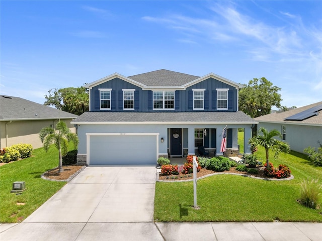 10618 Daybreak Gln, Parrish, FL 34219 - traditional-style home featuring concrete driveway, an attached garage, a front yard, and a porch