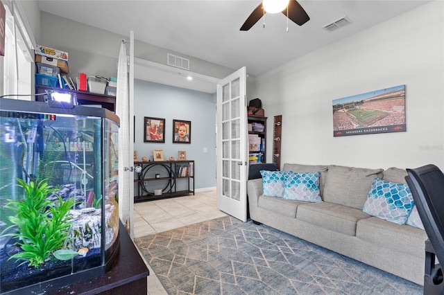 10618 Daybreak Gln, Parrish, FL 34219 - tiled living area featuring ceiling fan and french doors