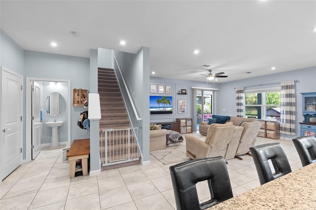 10618 Daybreak Gln, Parrish, FL 34219 - living room featuring recessed lighting, ceiling fan, stairway, and light tile patterned flooring