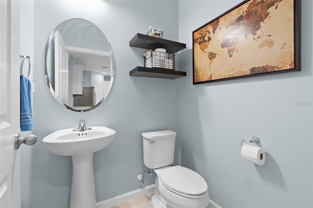 10618 Daybreak Gln, Parrish, FL 34219 - half bath with toilet and tile patterned floors