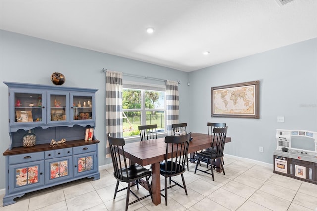10618 Daybreak Gln, Parrish, FL 34219 - dining space featuring light tile patterned floors and recessed lighting
