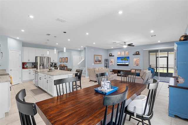 10618 Daybreak Gln, Parrish, FL 34219 - dining area with ceiling fan, light tile patterned floors, and recessed lighting