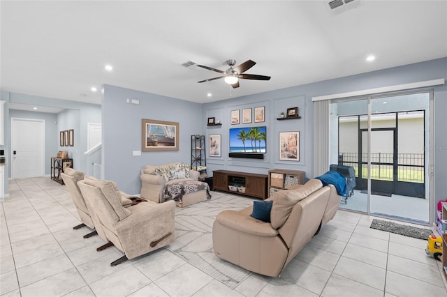 10618 Daybreak Gln, Parrish, FL 34219 - living room featuring light tile patterned floors, ceiling fan, and recessed lighting