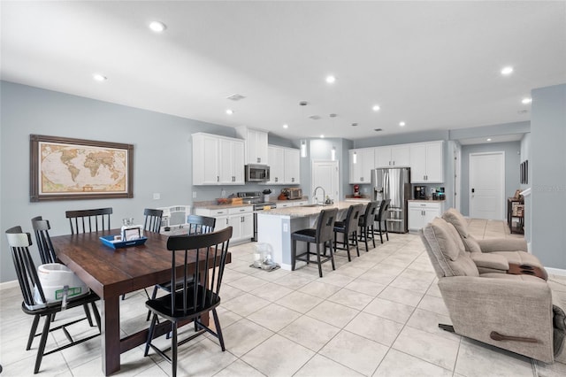 10618 Daybreak Gln, Parrish, FL 34219 - dining space featuring recessed lighting and light tile patterned floors
