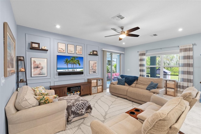 10618 Daybreak Gln, Parrish, FL 34219 - living room with a ceiling fan and recessed lighting