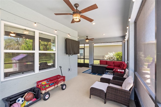 10618 Daybreak Gln, Parrish, FL 34219 - sunroom featuring an outdoor hangout area and a ceiling fan