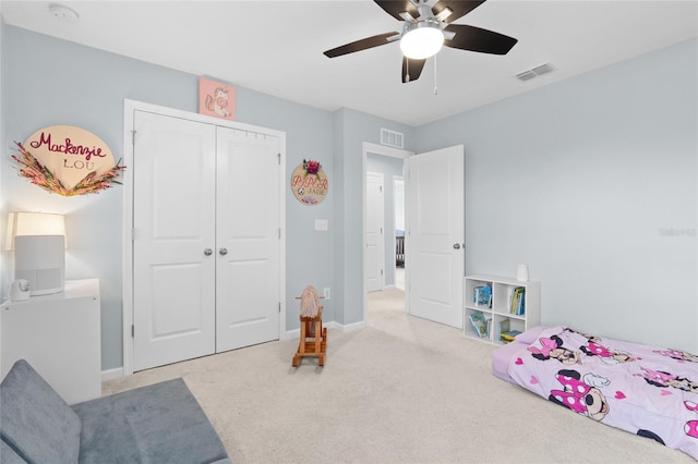 10618 Daybreak Gln, Parrish, FL 34219 - bedroom featuring carpet, a closet, and a ceiling fan