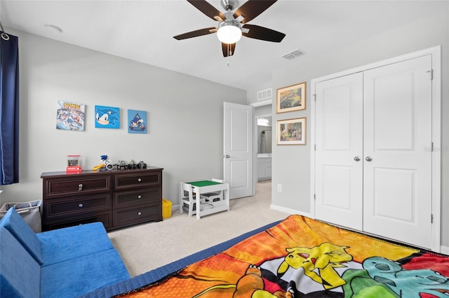 10618 Daybreak Gln, Parrish, FL 34219 - carpeted bedroom with a closet and ceiling fan