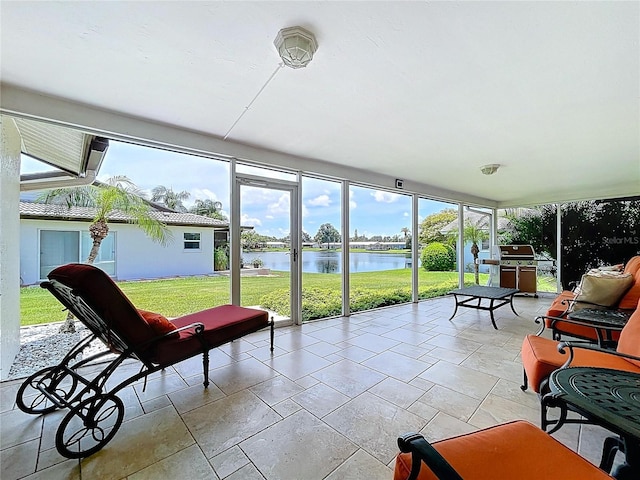 11141 Carla Dr, Largo, FL 33774 - sunroom featuring a water view and plenty of natural light