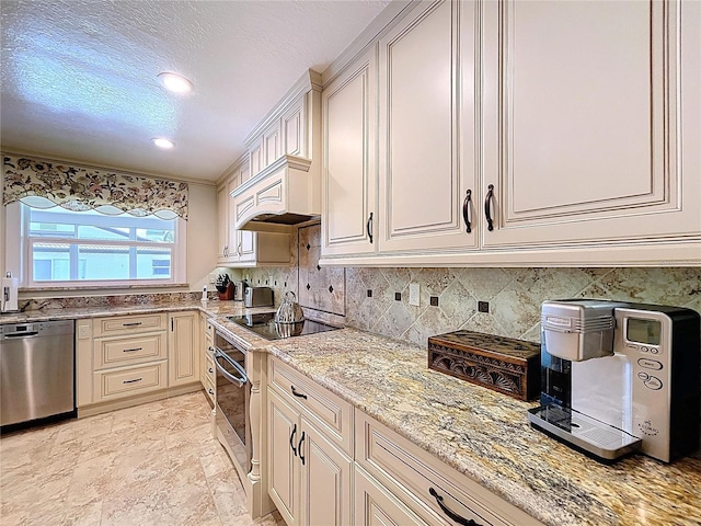 11141 Carla Dr, Largo, FL 33774 - kitchen with stainless steel appliances, light stone countertops, decorative backsplash, a textured ceiling, and recessed lighting