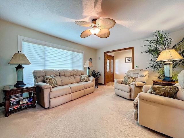 11141 Carla Dr, Largo, FL 33774 - living room featuring light carpet and ceiling fan