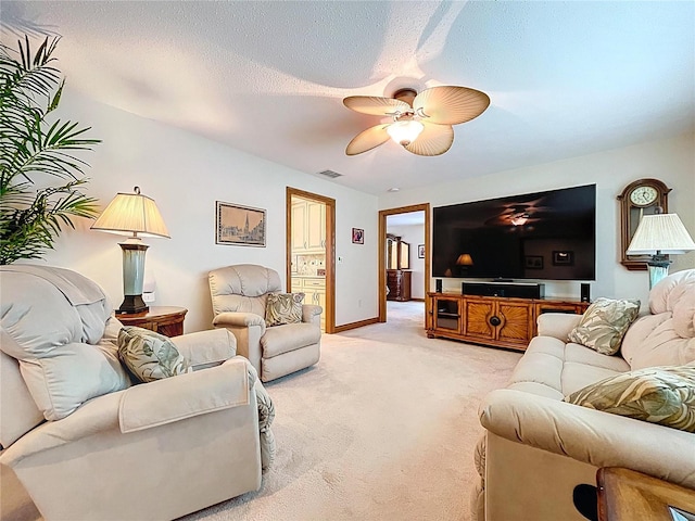 11141 Carla Dr, Largo, FL 33774 - living area with a ceiling fan and light carpet