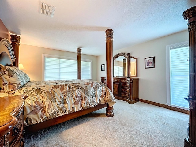 11141 Carla Dr, Largo, FL 33774 - carpeted bedroom featuring baseboards