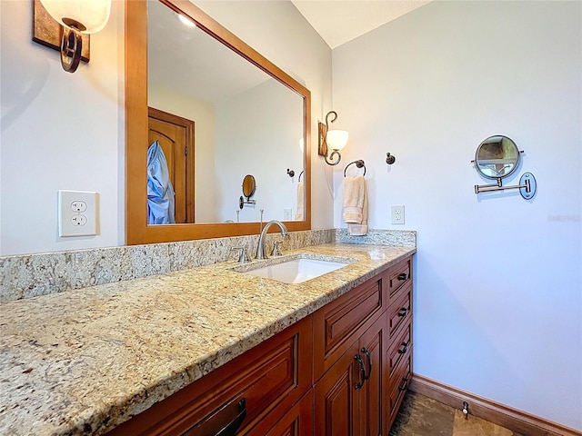 11141 Carla Dr, Largo, FL 33774 - bathroom featuring vanity and baseboards