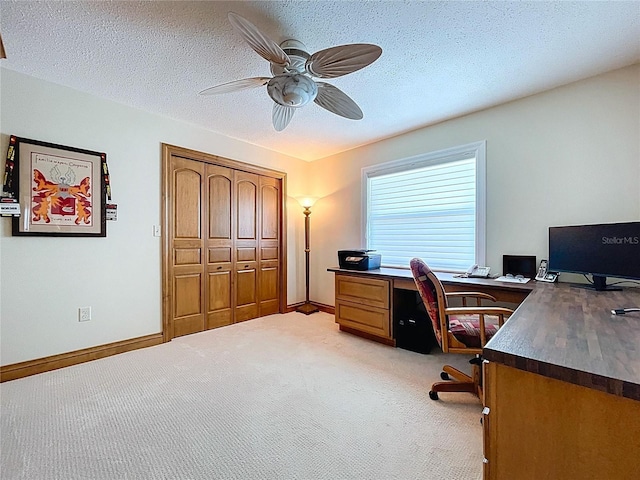 11141 Carla Dr, Largo, FL 33774 - office featuring light colored carpet, ceiling fan, and a textured ceiling