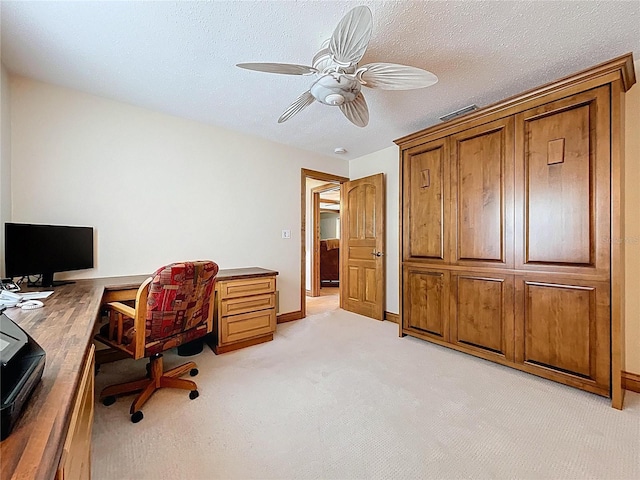 11141 Carla Dr, Largo, FL 33774 - home office with light colored carpet and a ceiling fan