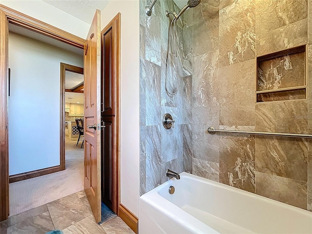 11141 Carla Dr, Largo, FL 33774 - full bath featuring shower / tub combination and marble finish floors