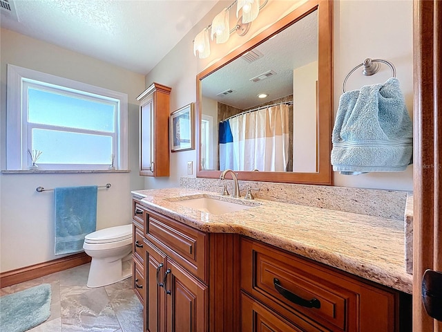 11141 Carla Dr, Largo, FL 33774 - bathroom featuring vanity, a textured ceiling, and curtained shower