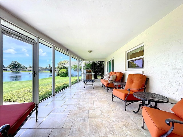 11141 Carla Dr, Largo, FL 33774 - sunroom featuring a water view and outdoor lounge area