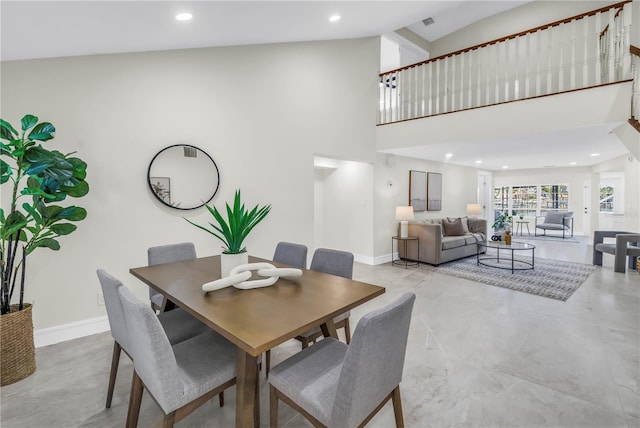 17601 Sterling Ter, Redington Shores, FL 33708 - dining space with a high ceiling, recessed lighting, and concrete flooring