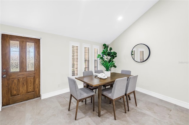 17601 Sterling Ter, Redington Shores, FL 33708 - dining room with lofted ceiling and recessed lighting
