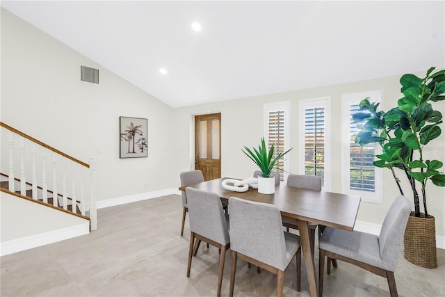 17601 Sterling Ter, Redington Shores, FL 33708 - dining room with stairs, vaulted ceiling, and recessed lighting