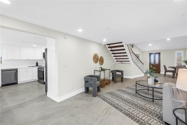 17601 Sterling Ter, Redington Shores, FL 33708 - living area featuring stairs and recessed lighting