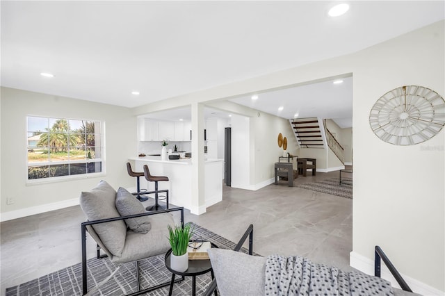 17601 Sterling Ter, Redington Shores, FL 33708 - living room with stairway and recessed lighting