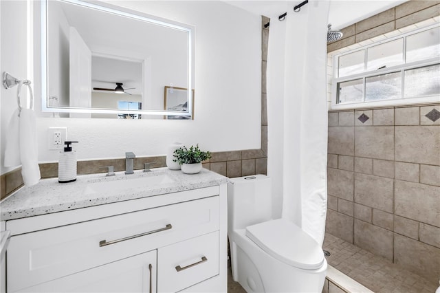 17601 Sterling Ter, Redington Shores, FL 33708 - full bath featuring a stall shower, vanity, and ceiling fan