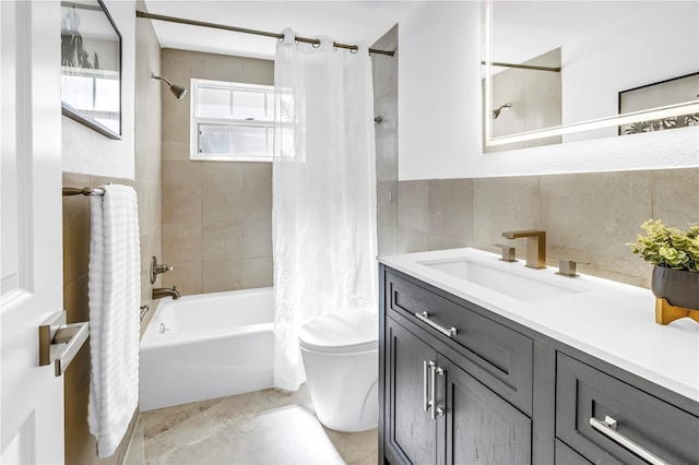 17601 Sterling Ter, Redington Shores, FL 33708 - full bathroom with tile walls, shower / bath combination with curtain, and vanity