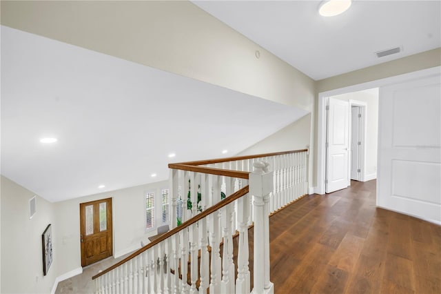 17601 Sterling Ter, Redington Shores, FL 33708 - hallway featuring wood finished floors, recessed lighting, and an upstairs landing