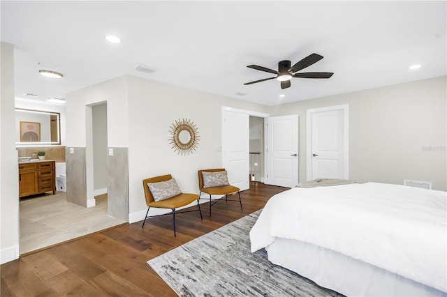 17601 Sterling Ter, Redington Shores, FL 33708 - bedroom featuring wood finished floors, recessed lighting, ceiling fan, and ensuite bath