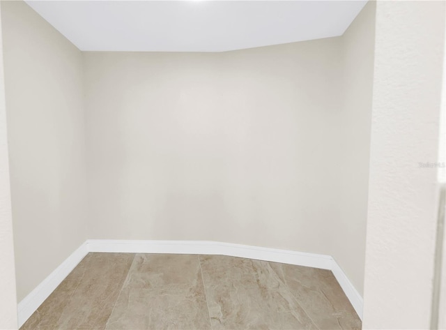 17601 Sterling Ter, Redington Shores, FL 33708 - spare room with baseboards