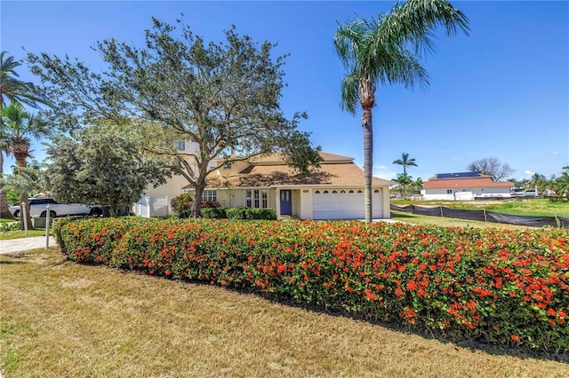 17601 Sterling Ter, Redington Shores, FL 33708 - view of front of property with a garage