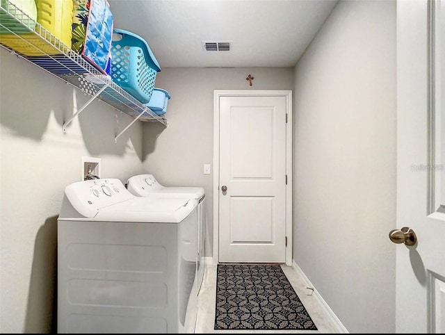 4282 Salt Springs Ln, Lakeland, FL 33811 - laundry room featuring washer and dryer and baseboards