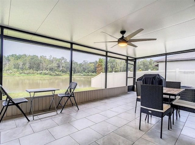 4282 Salt Springs Ln, Lakeland, FL 33811 - sunroom with ceiling fan, outdoor dining area, a water view, and a view of trees