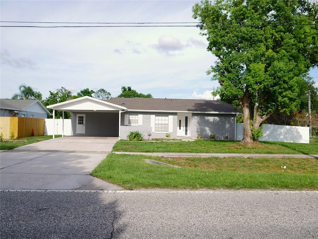 1302 Highview Rd, Brandon, FL 33510 - ranch-style home featuring an attached carport and driveway
