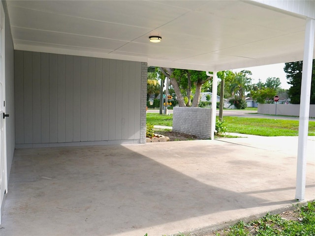1302 Highview Rd, Brandon, FL 33510 - view of patio featuring an attached carport
