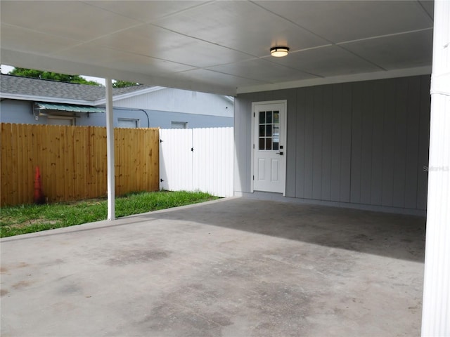 1302 Highview Rd, Brandon, FL 33510 - view of patio with an attached carport and a gate
