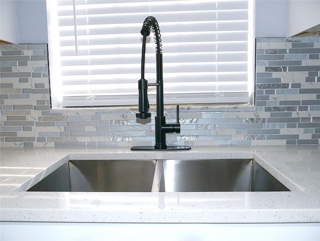 1302 Highview Rd, Brandon, FL 33510 - kitchen view of decorative backsplash and light stone countertops