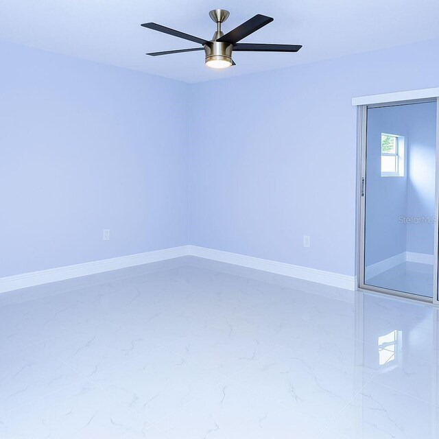 1302 Highview Rd, Brandon, FL 33510 - empty room featuring ceiling fan and marble finish floors