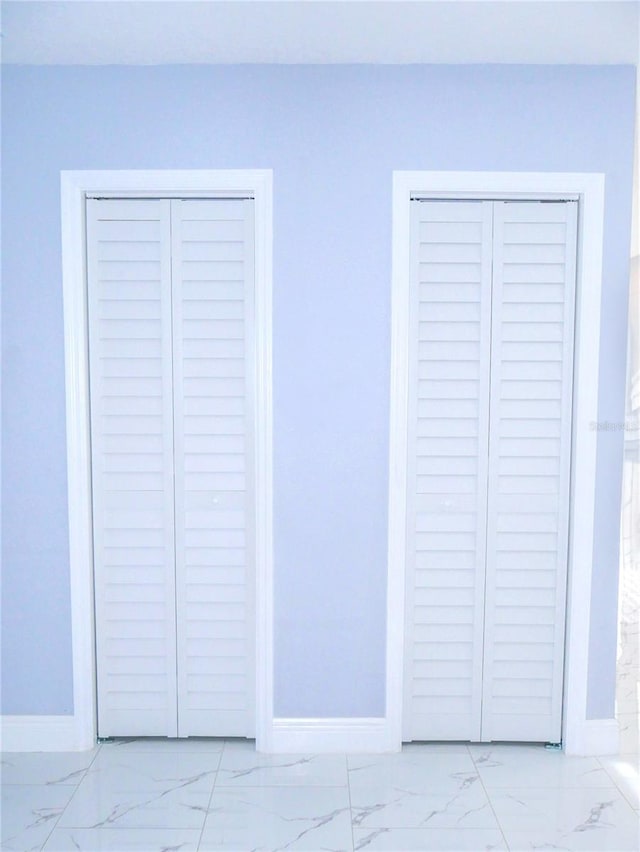 1302 Highview Rd, Brandon, FL 33510 - unfurnished bedroom featuring light marble finish floors