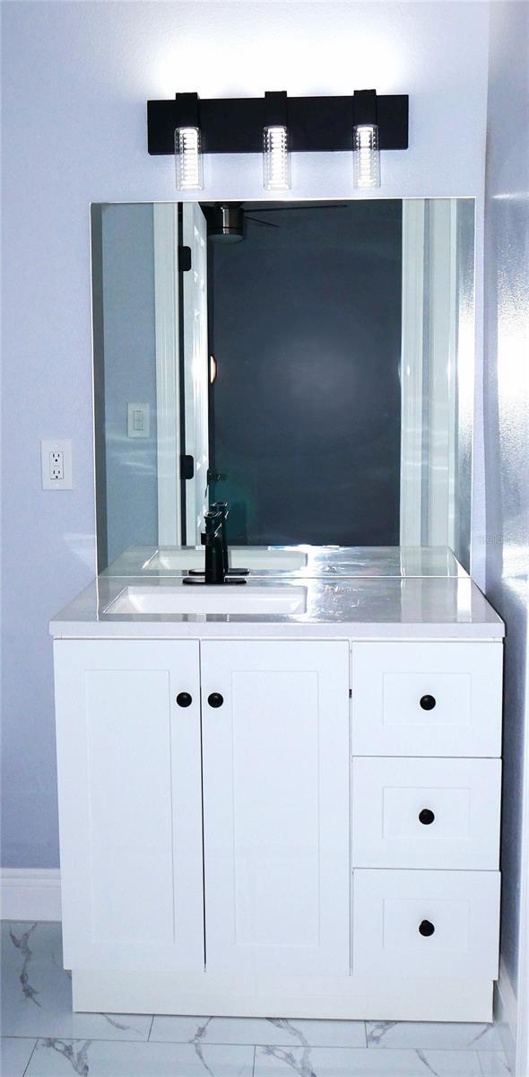 1302 Highview Rd, Brandon, FL 33510 - detailed view of a sink and baseboards